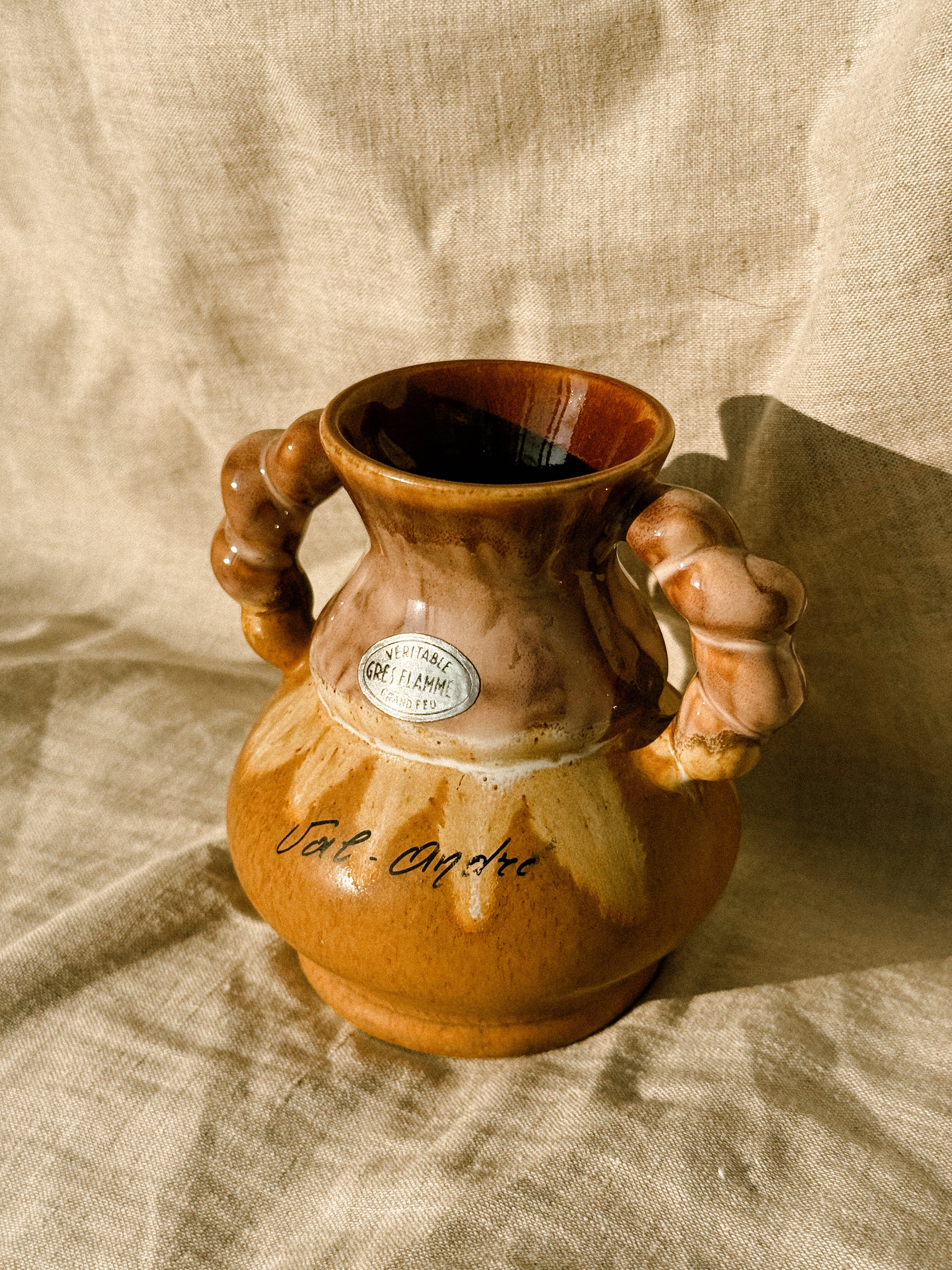 HN033 | “Val-André” stoneware jug with sculptural handles, 1970