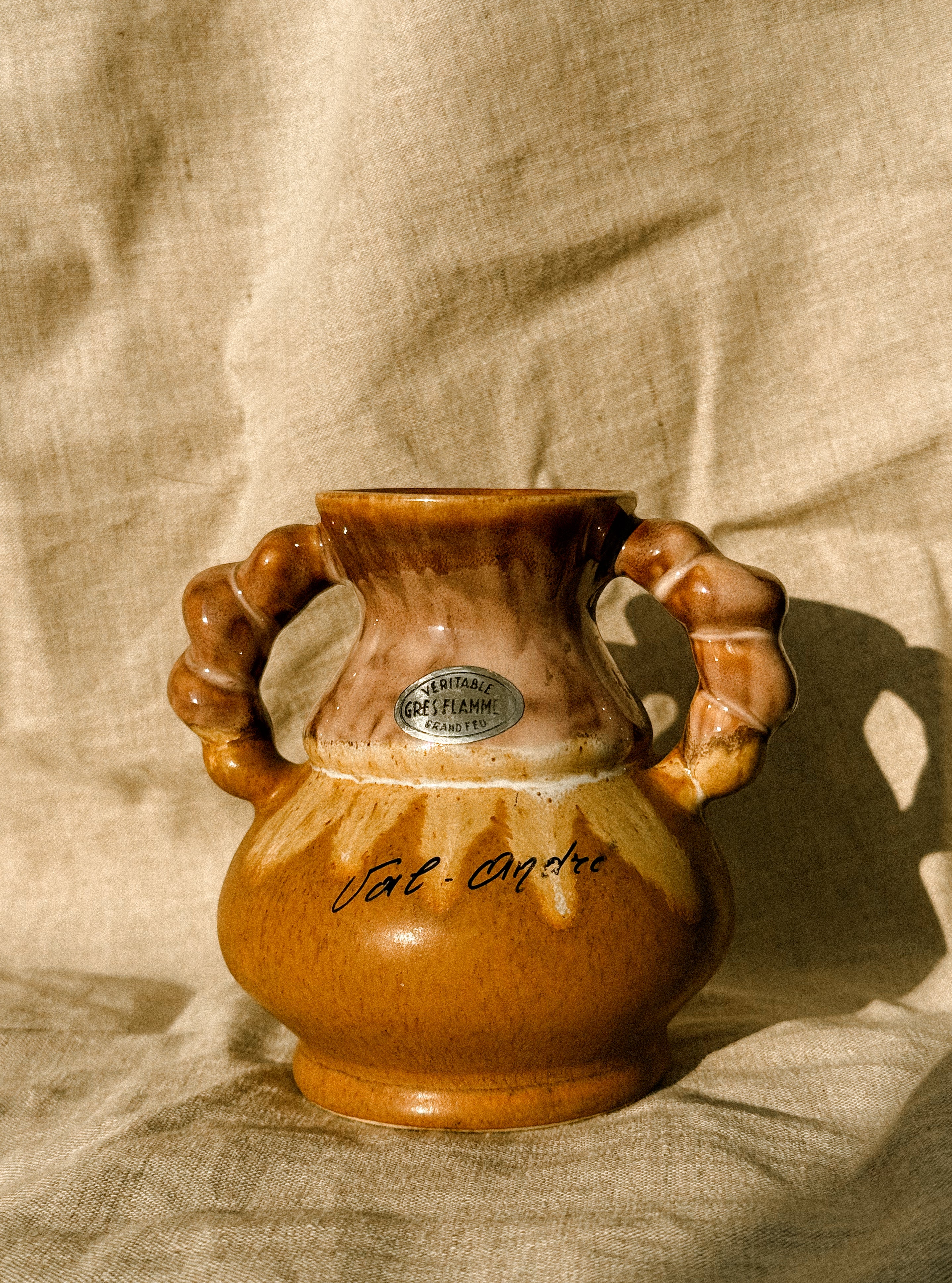 HN033 | “Val-André” stoneware jug with sculptural handles, 1970