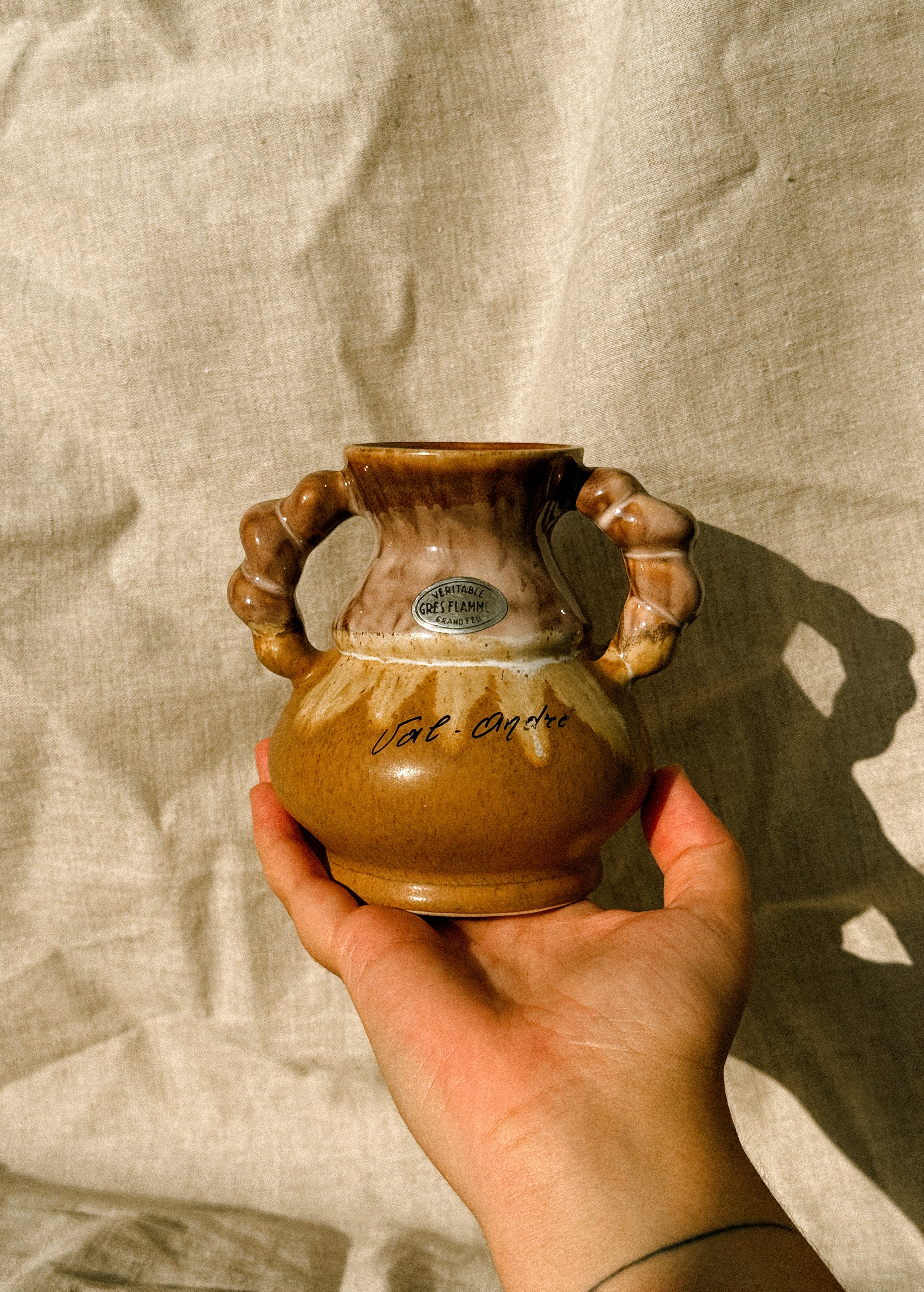 HN033 | “Val-André” stoneware jug with sculptural handles, 1970
